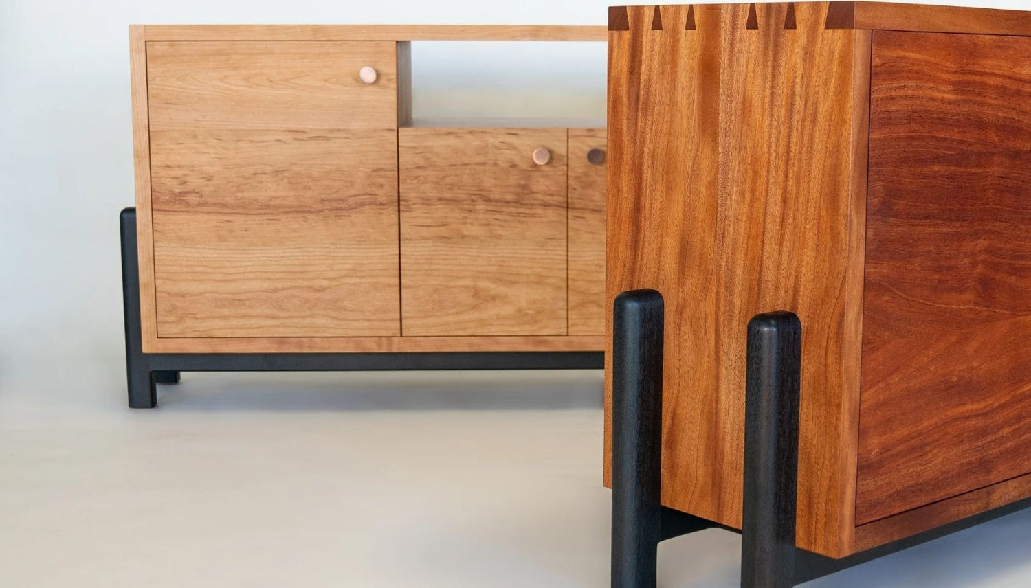 Pair of JOHI cradle consoles made with solid wood