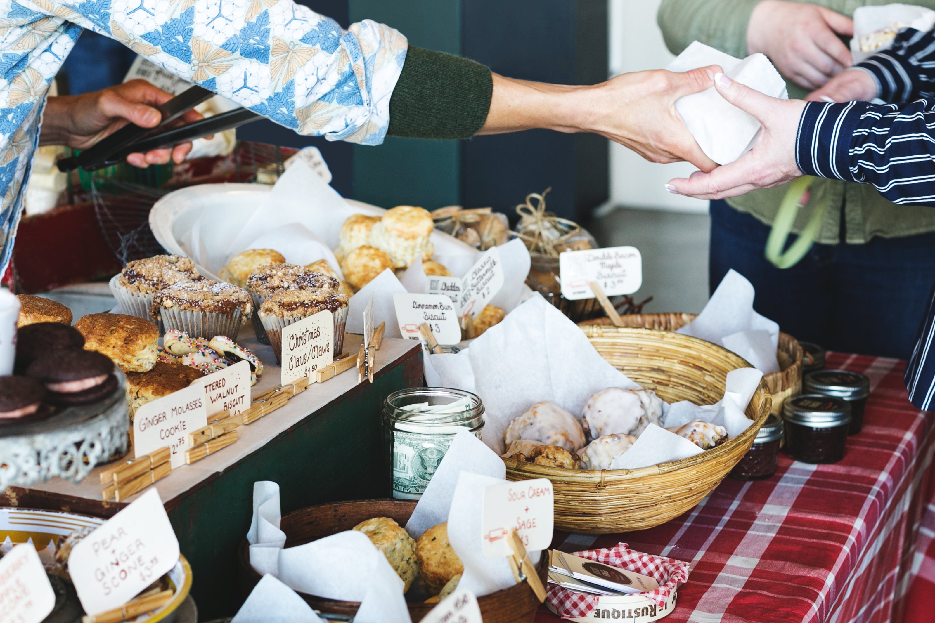 Bakery stand at a Farmers Market - Muffins, Scones, and more Pastries on a Two-Tiered Table