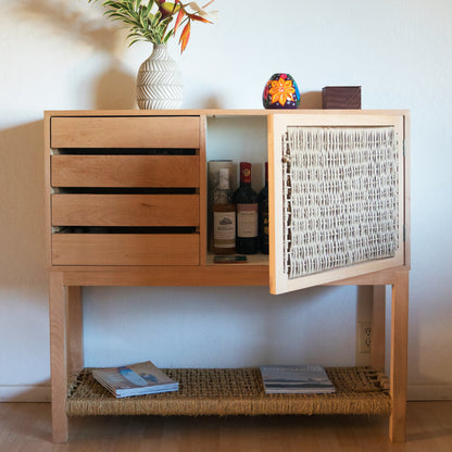 Lifestyle use of entry console as bar cabinet.